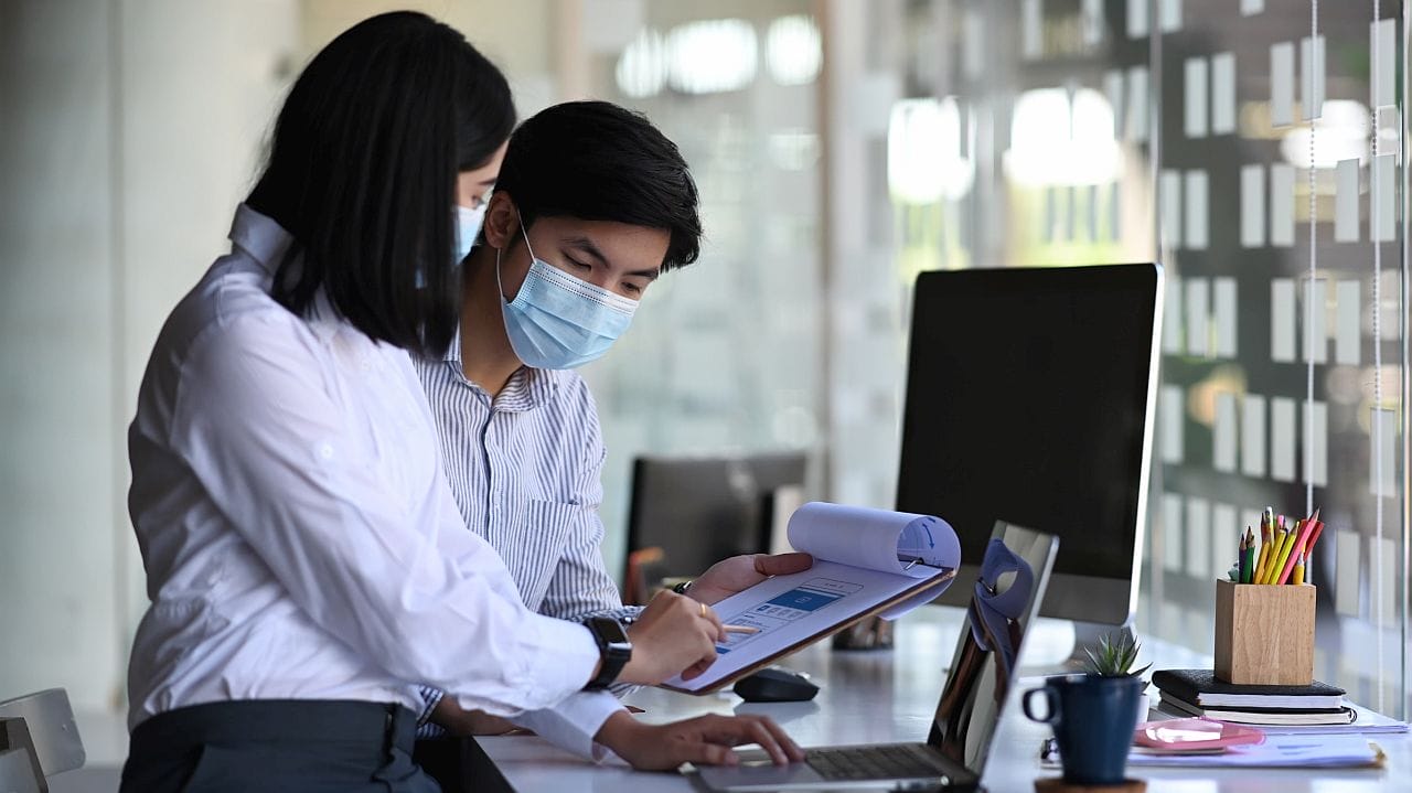 Two researchers working together; patient data concept