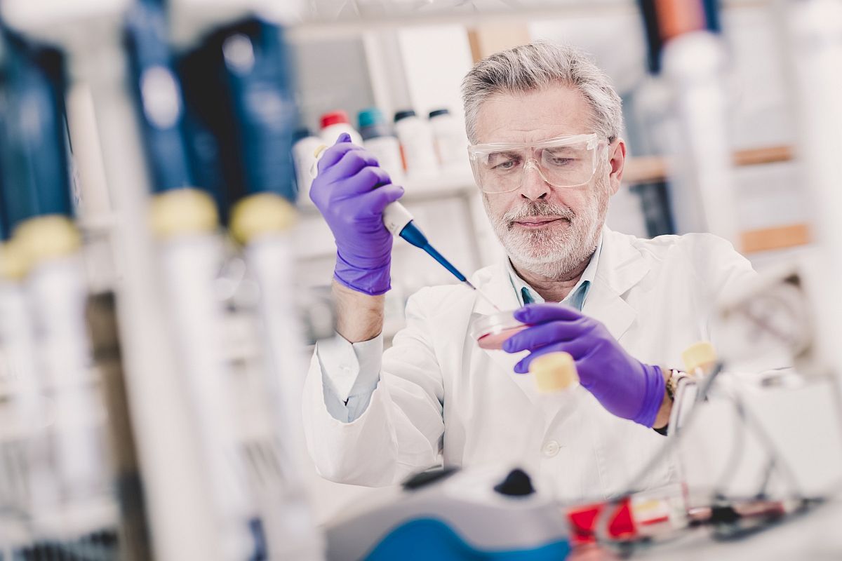 Scientist at work in lab; specialty drug market concept 