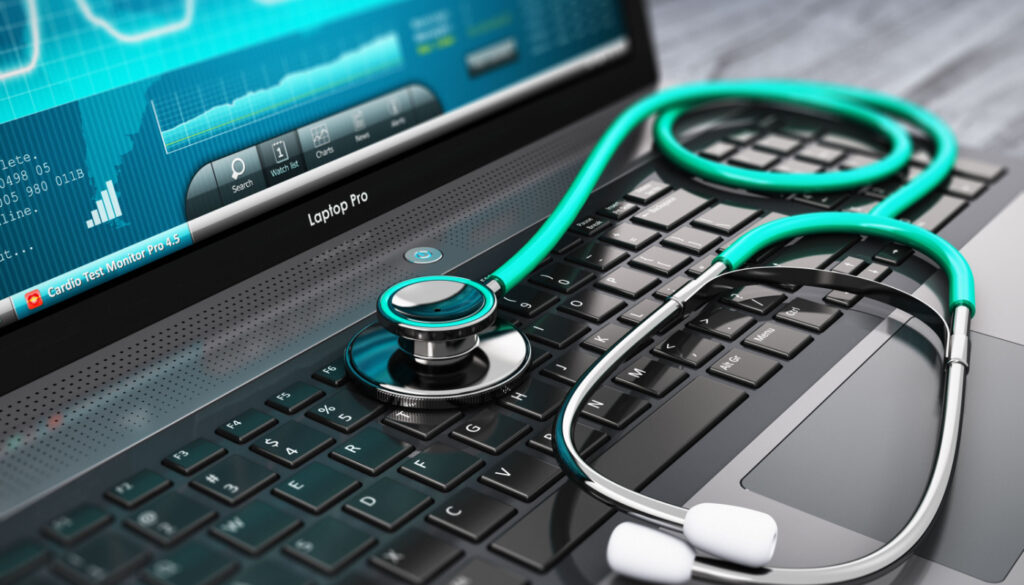 Stethoscope lying on computer keyboard; protect patient data concept