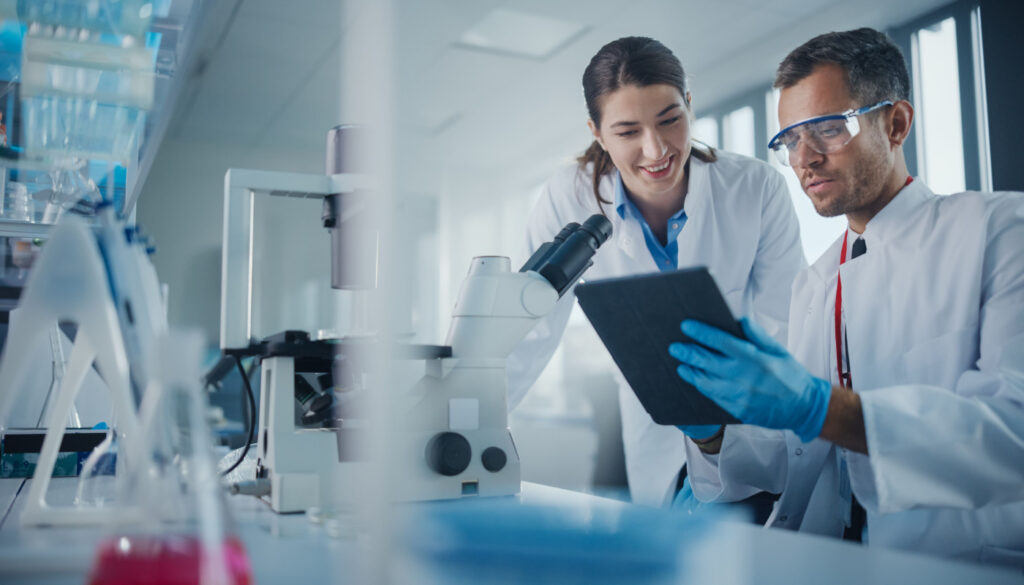 Scientists working in research lab; pharma market insights concept
