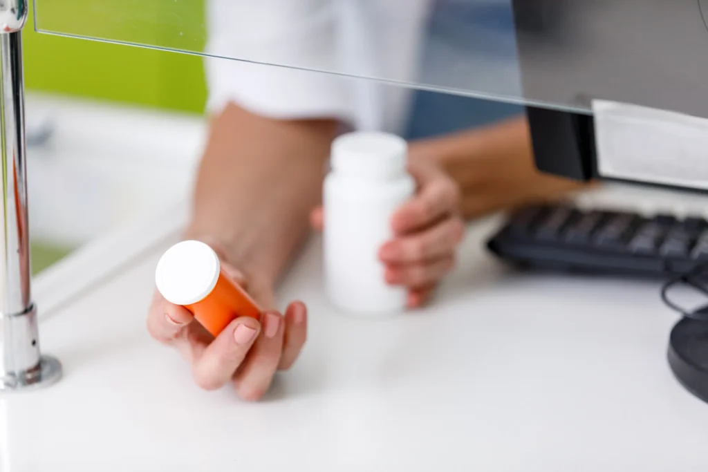 Pharmacist deciding between medication