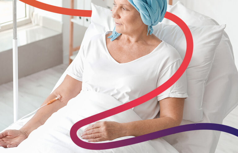 A woman sits in a hospital bed, her gentle expression reflecting resilience as she embraces her healing journey.